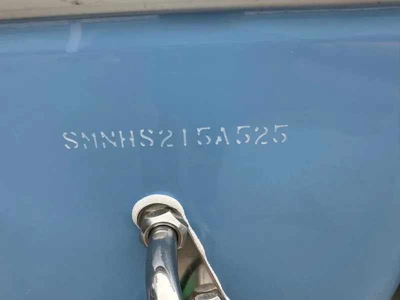 Slide: The Image of Hull identification number on 2025 Sportsman Heritage 231 Center Console boat. - 11