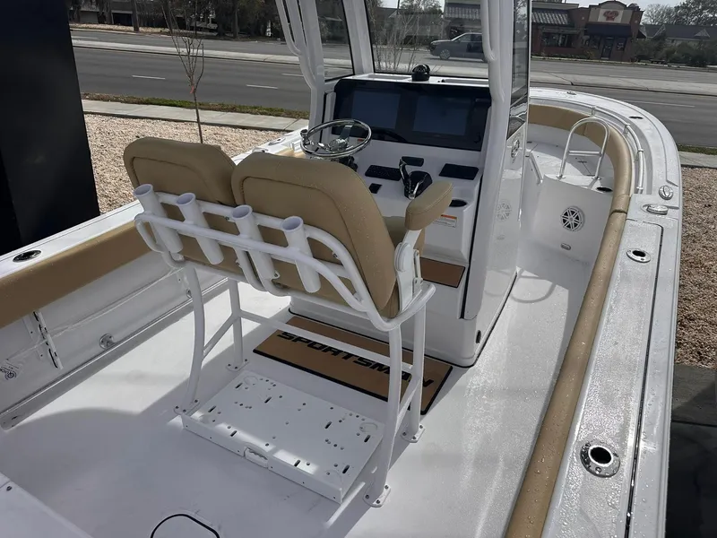 Slide: The Image of 2025 Sportsman Heritage 231 Center Console boat interior with helm and seating. - 16