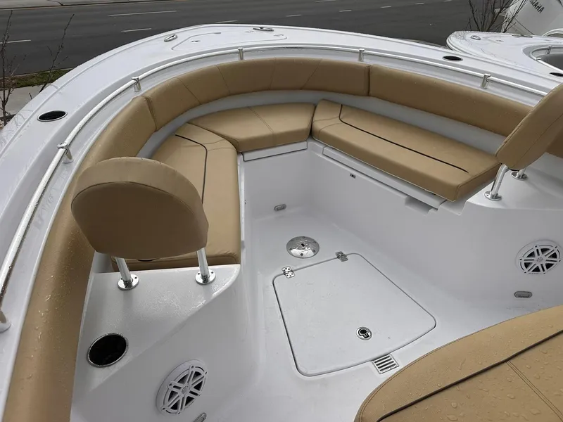 Slide: The Image of 2025 Sportsman Heritage 231 Center Console boat with tan seating and white deck. - 35