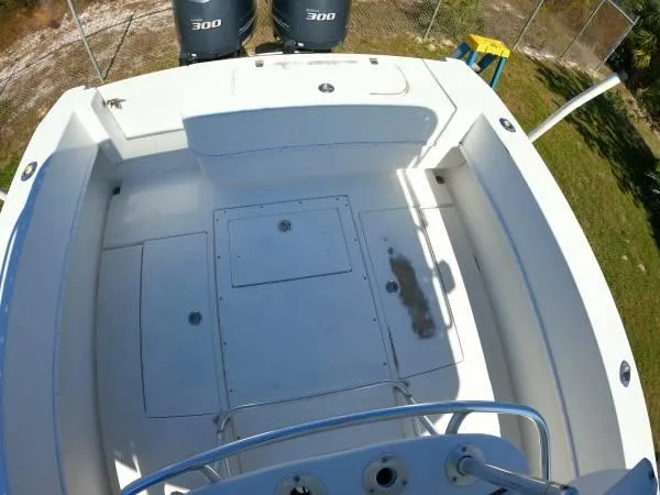 Slide: The Image of 1999 Contender 28 Sport boat deck with dual 300 engines, viewed from above. - 11