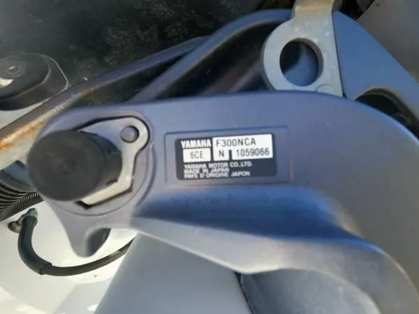 Slide: The Image of Yamaha F300NCA engine part on 1999 Contender 28 Sport boat. - 17