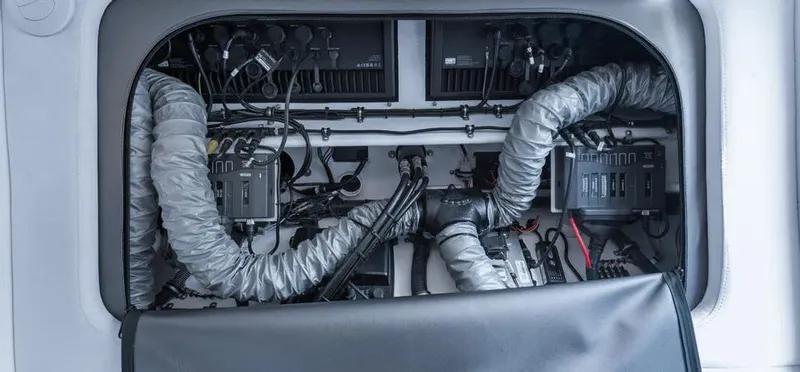 Slide: The Image of 2023 Nor-Tech 390 Sport Center Console electrical system with wiring and components. - 18