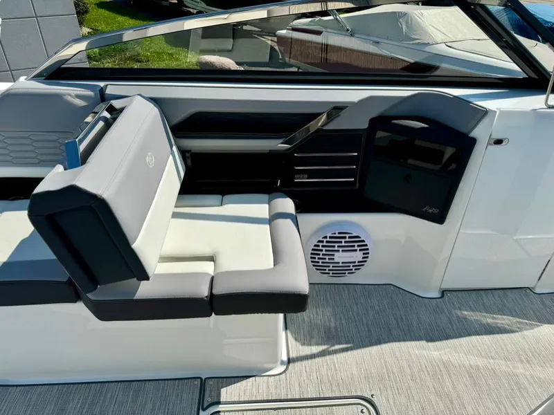 Slide: The Image of 2022 Cobalt A29 boat interior with sleek seating and modern design. - 16