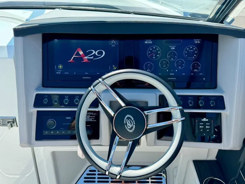 Slide: The Image of 2022 Cobalt A29 boat dashboard with steering wheel and digital displays. - 18