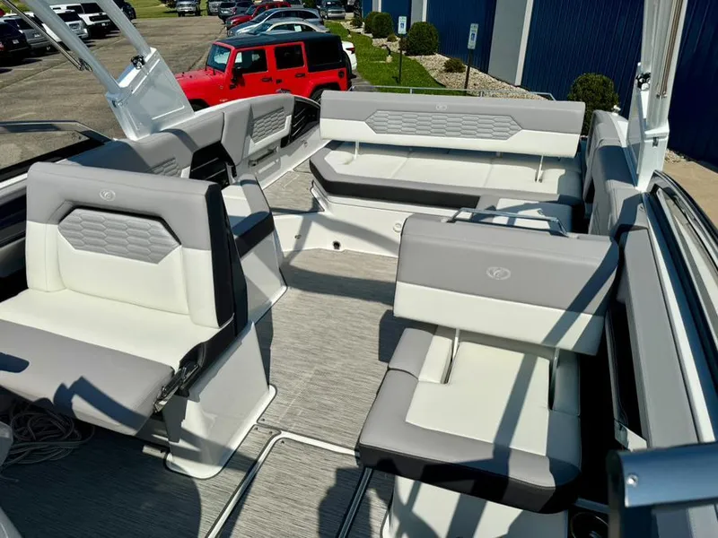 Slide: The Image of 2022 Cobalt A29 boat interior with luxurious seating and modern design. - 28