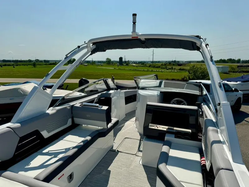 Slide: The Image of 2022 Cobalt A29 boat interior with sleek seating and modern dashboard. - 29