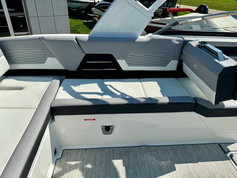 Slide: The Image of 2022 Cobalt A29 boat interior with sleek seating and modern design. - 37