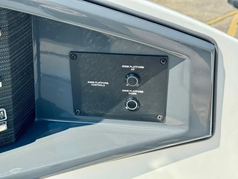 Slide: The Image of Control panel for swim platform on 2022 Cobalt A29 boat. - 47