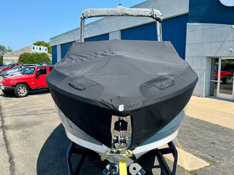 Slide: The Image of 2022 Cobalt A29 boat with cover, parked outside dealership. - 49