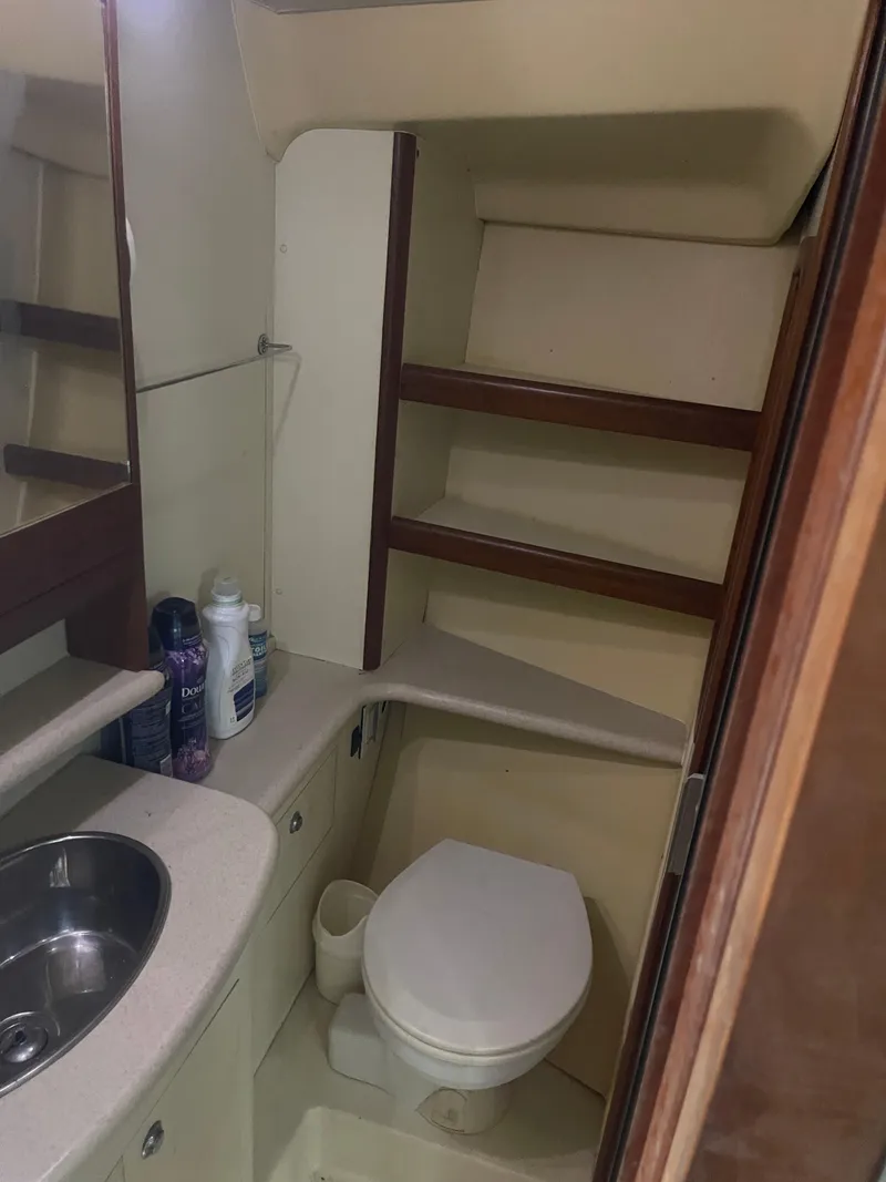 Slide: The Image of Yanmar engine in a 2004 Hunter 44 DS Deck Salon sailboat. - 49