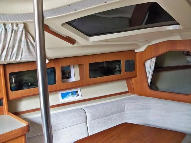 Slide: The Image of Rich interior teak, storage, curtains, handrails - 14