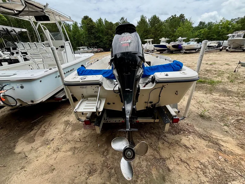 Slide: The Image of 2004 Sea Chaser 220 Bay Runner boat with outboard motor in a boatyard. - 3
