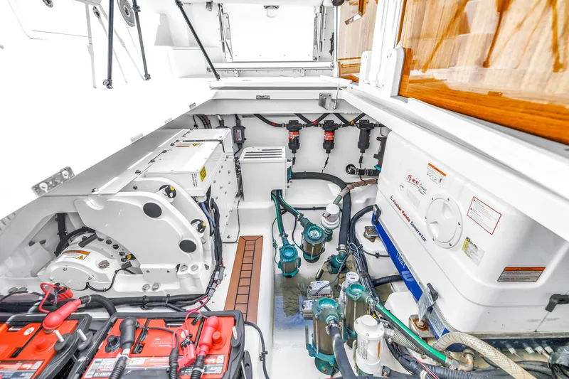 Slide: The Image of Engine room of 2023 Boston Whaler 405 Conquest, showcasing mechanical components and systems. - 44