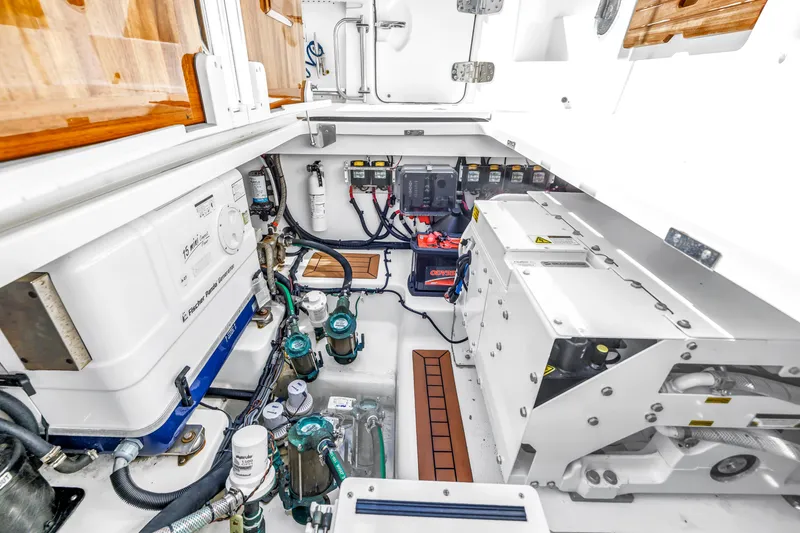 Slide: The Image of Engine room of 2023 Boston Whaler 405 Conquest, showcasing advanced marine equipment and systems. - 46