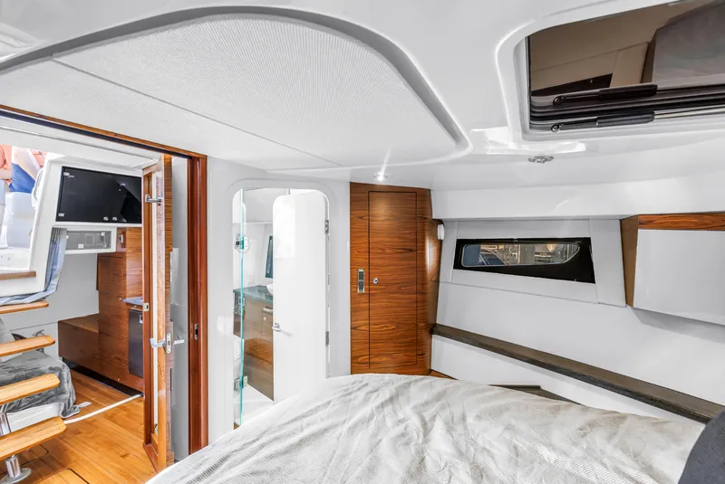 Slide: The Image of Luxurious interior of 2023 Boston Whaler 405 Conquest yacht cabin with modern amenities. - 48