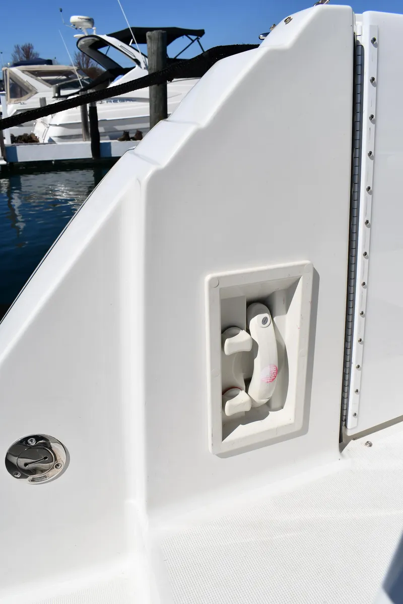 Slide: The Image of 2002 Formula 31 PC boat detail with dockside water connection. - 14