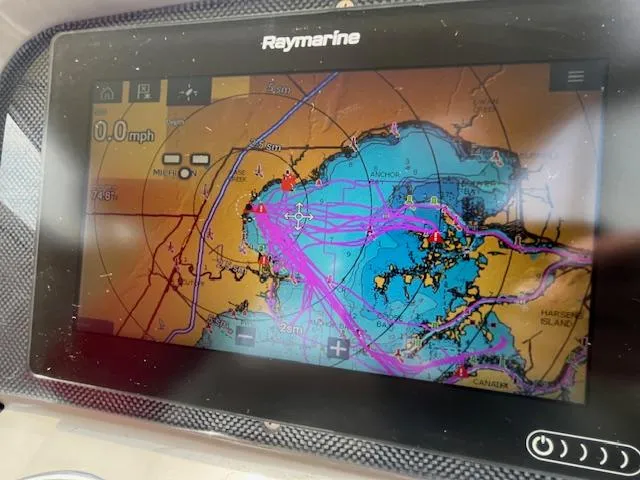 Slide: The Image of Raymarine GPS display on 2002 Formula 31 PC boat showing nautical chart. - 21