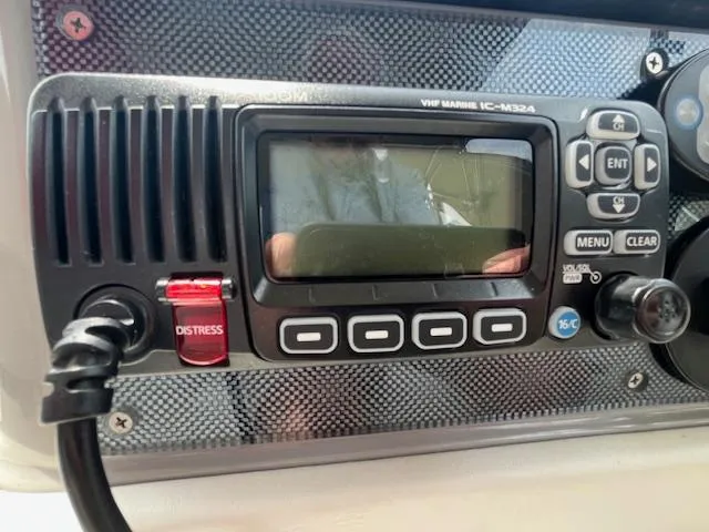 Slide: The Image of VHF marine radio IC-M324 on a 2002 Formula 31 PC boat dashboard. - 22