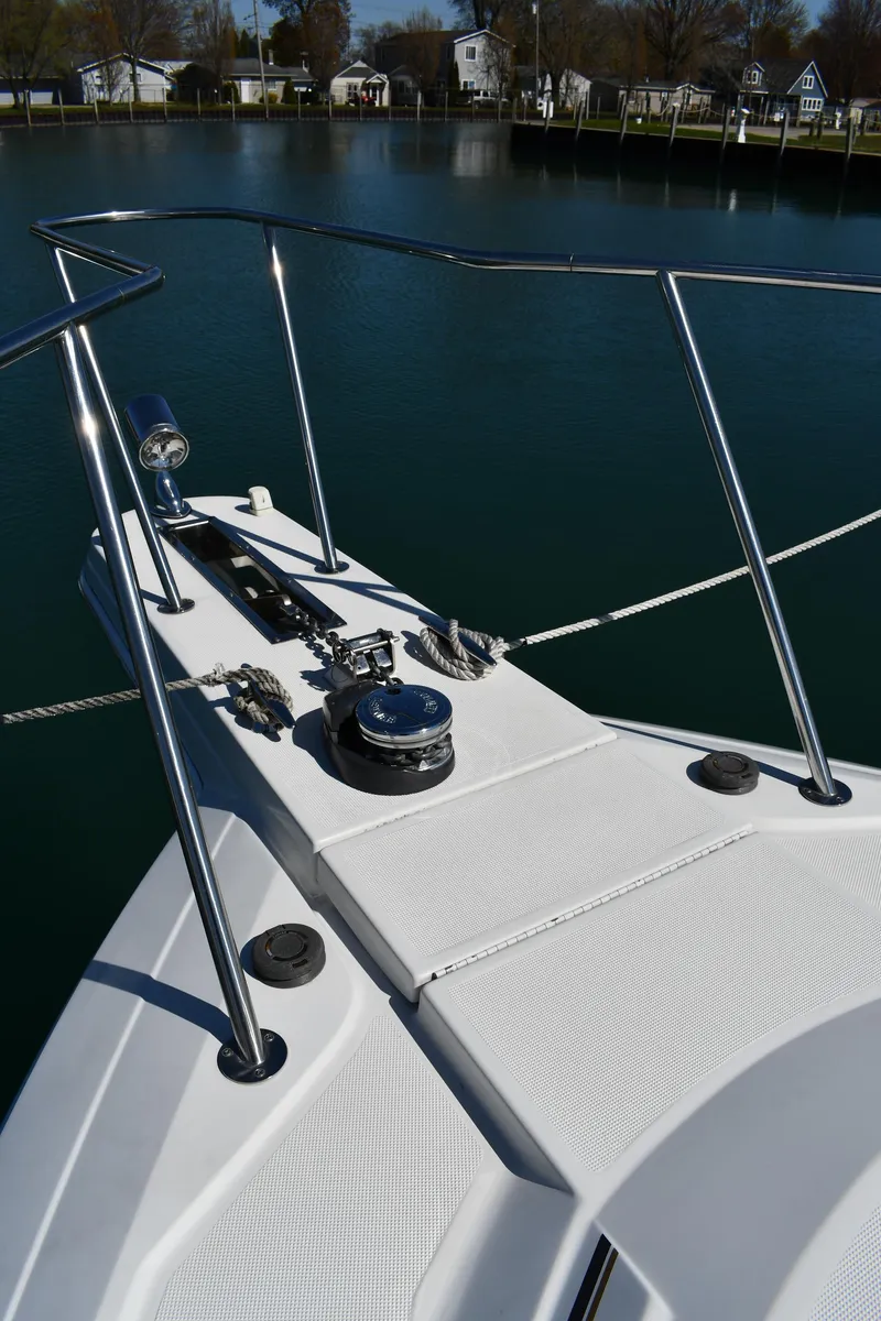 Slide: The Image of Bow of 2002 Formula 31 PC boat with stainless steel railings and anchor system. - 3