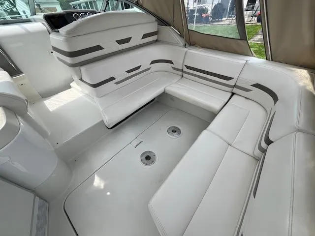 Slide: The Image of 2002 Formula 31 PC boat interior with white seating and modern design. - 35