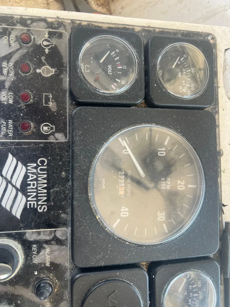Slide: The Image of Control panel of a 1984 JC 35 boat with Cummins Marine gauges. - 20