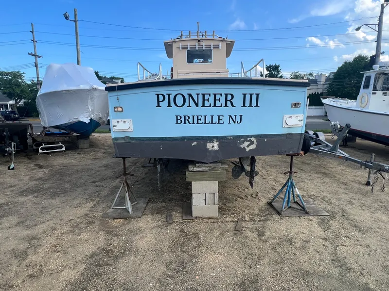 Slide: The Image of Boat named "Pioneer III" from Brielle, NJ, on land; JC 35 model, 1984. - 4