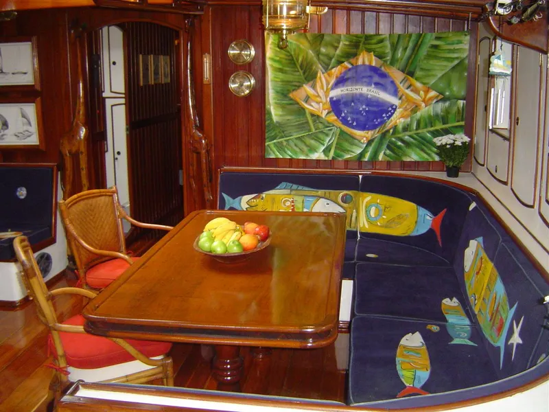Slide: The Image of Luxurious 1991 Horacio Carabelli Schooner interior with vibrant decor and dining area. - 12