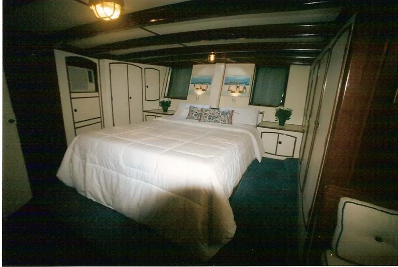 Slide: The Image of Luxurious bedroom interior of 1991 Custom Horacio Carabelli Schooner with elegant decor and cozy bedding. - 21