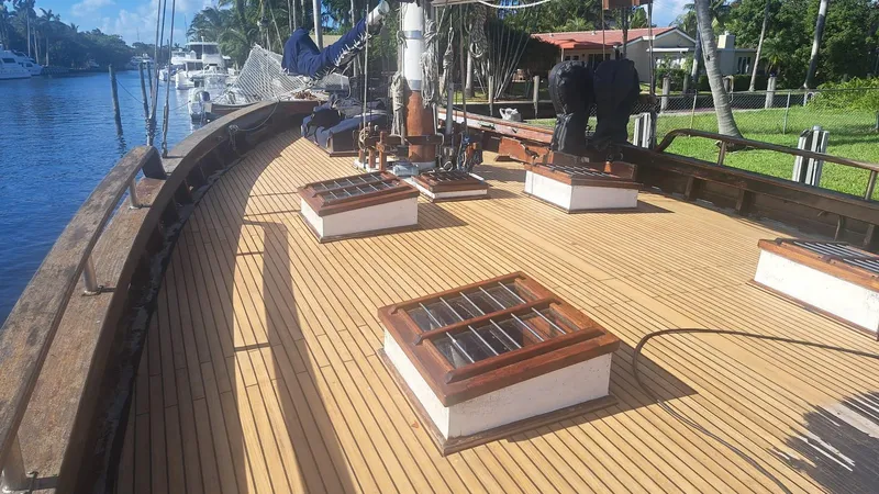 Slide: The Image of Deck of 1991 Custom Horacio Carabelli Schooner with wooden finish and nautical equipment. - 36