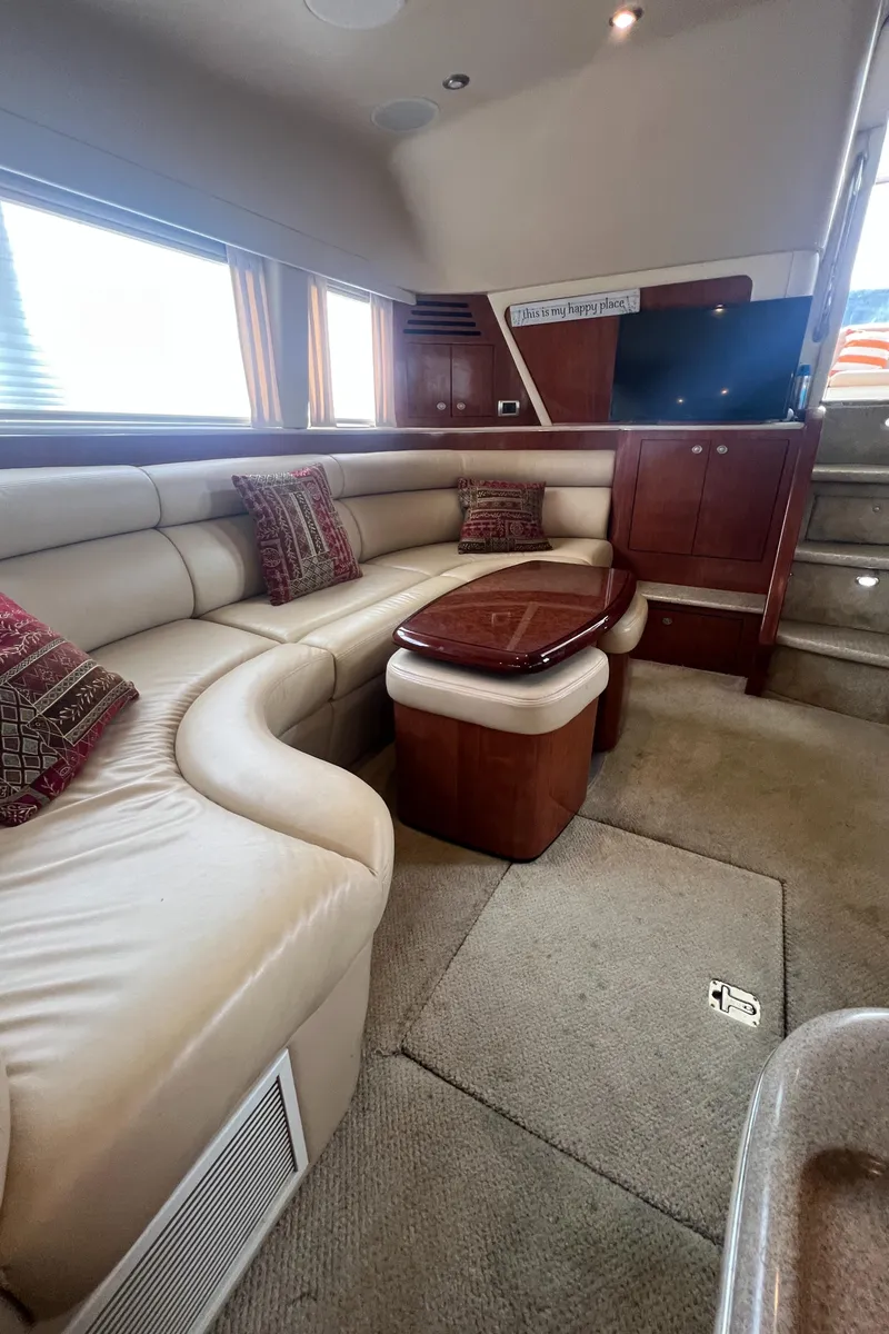 Slide: The Image of Luxurious interior of 2004 Sea Ray 480 Motor Yacht with plush seating and elegant decor. - 44