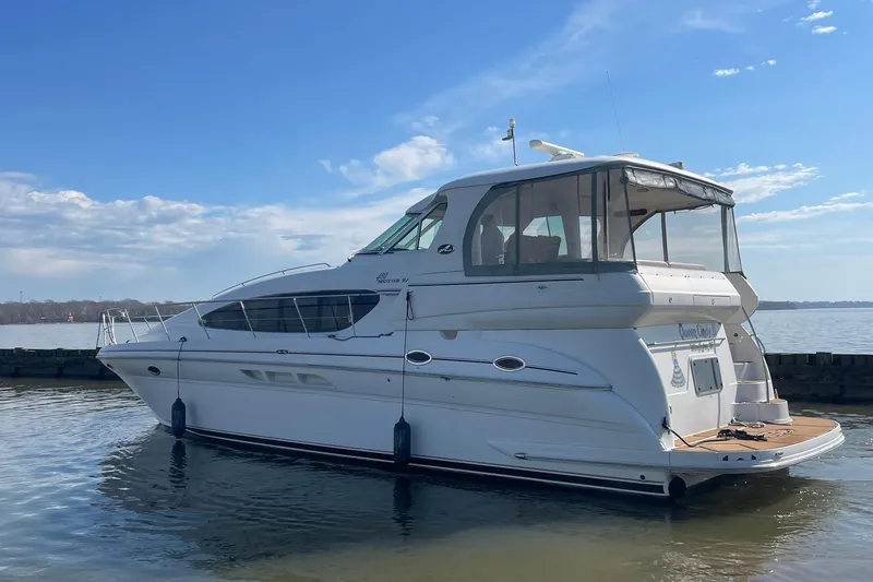 Slide: The Image of 2004 Sea Ray 480 Motor Yacht docked on a sunny day. - 71