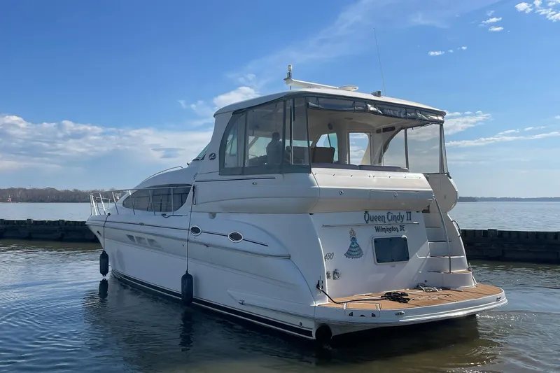 Slide: The Image of 2004 Sea Ray 480 Motor Yacht docked on a sunny day. - 72