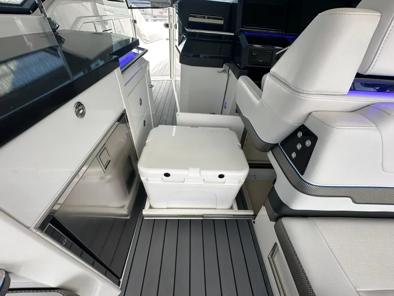 Slide: The Image of Interior of 2021 Formula 400 Super Sport Crossover with seating and storage. - 12