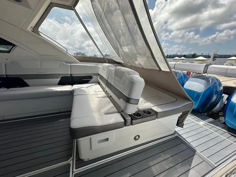 Slide: The Image of 2021 Formula 400 Super Sport Crossover yacht interior with luxurious seating and modern design. - 14
