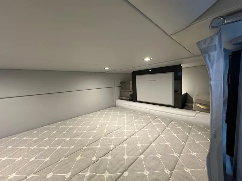 Slide: The Image of 2021 Formula 400 Super Sport Crossover cabin interior with bed and modern lighting. - 20