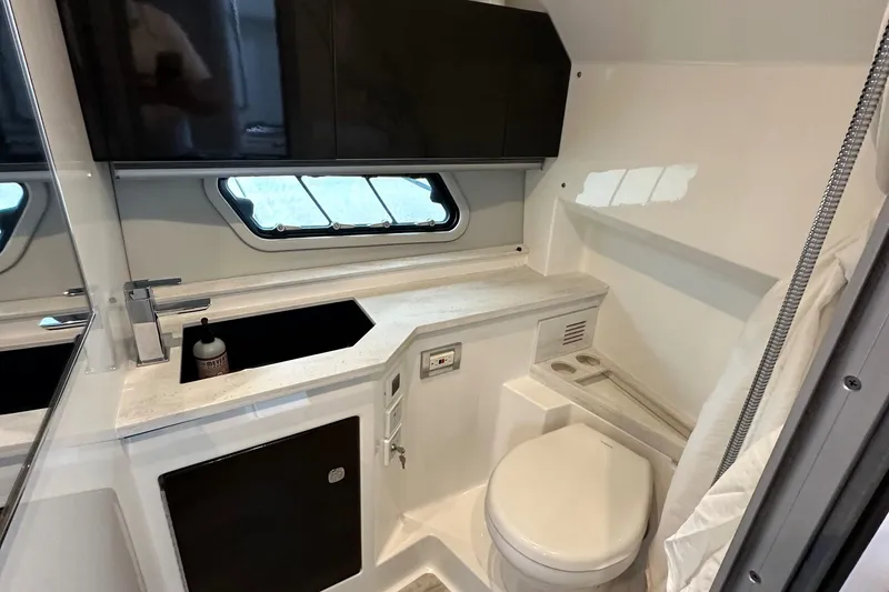 Slide: The Image of 2021 Formula 400 Super Sport Crossover bathroom with modern fixtures and sleek design. - 24