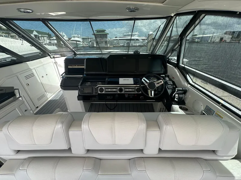 Slide: The Image of 2021 Formula 400 Super Sport Crossover cockpit with modern controls and luxurious seating. - 5