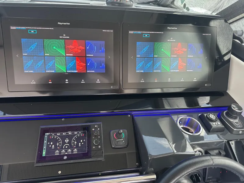 Slide: The Image of Control panel of a 2021 Formula 400 Super Sport Crossover with dual Raymarine displays. - 6