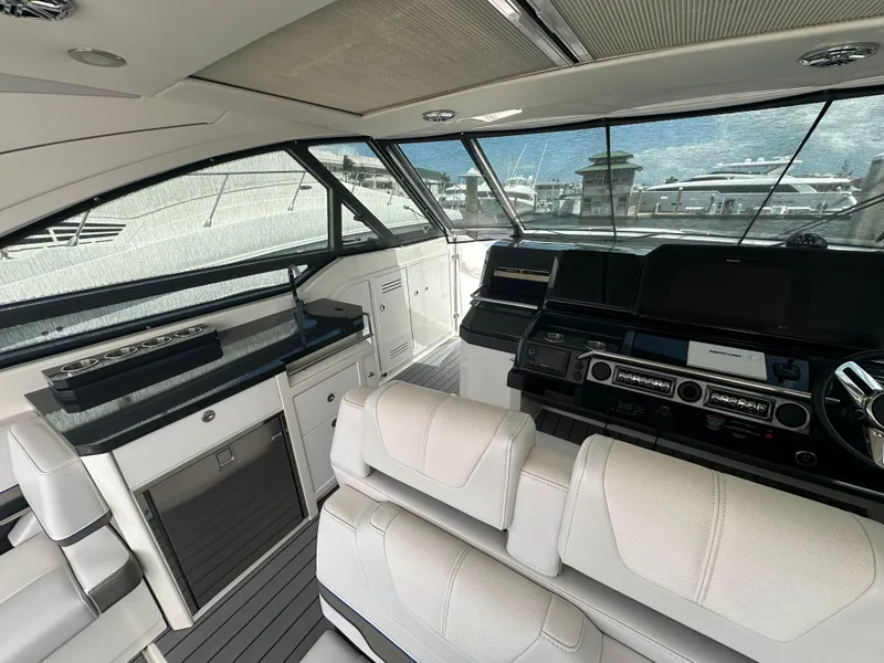 Slide: The Image of Luxurious interior of a 2021 Formula 400 Super Sport Crossover yacht, featuring sleek design and modern amenities. - 7