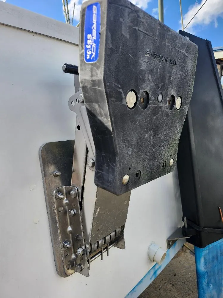 Slide: The Image of Mounting bracket on a 1988 Hunter 23 sailboat, featuring Garelick hardware. - 20