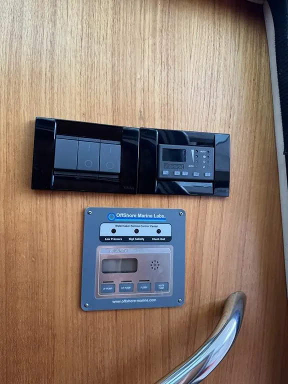 Slide: The Image of Control panel on 2004 Tiara Yachts 3600 Sovran, featuring Offshore Marine Labs equipment. - 36