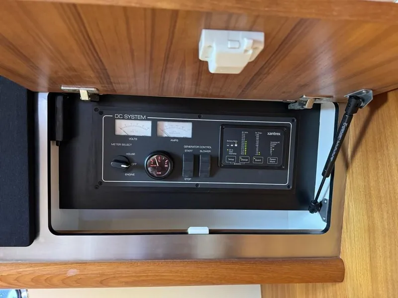 Slide: The Image of 2004 Tiara Yachts 3600 Sovran DC system panel with wood finish. - 37