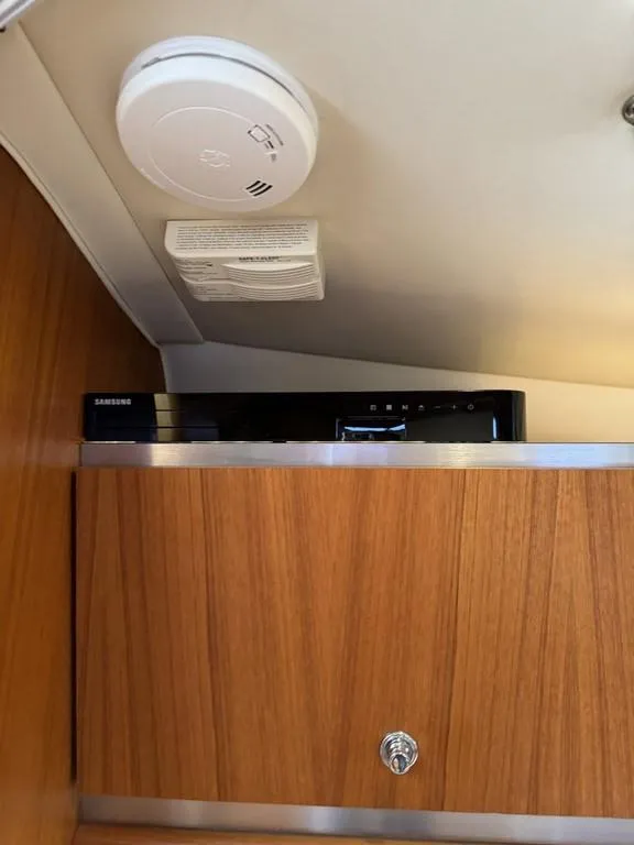 Slide: The Image of Interior of 2004 Tiara Yachts 3600 Sovran with smoke detector and Samsung device. - 38