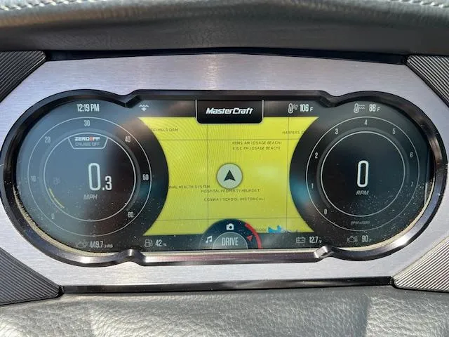 Slide: The Image of 2022 MasterCraft XStar S dashboard display showing speed, RPM, and navigation. - 11