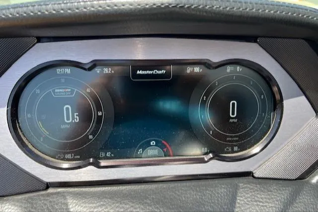 Slide: The Image of Dashboard of 2022 MasterCraft XStar S boat displaying speed and RPM gauges. - 16