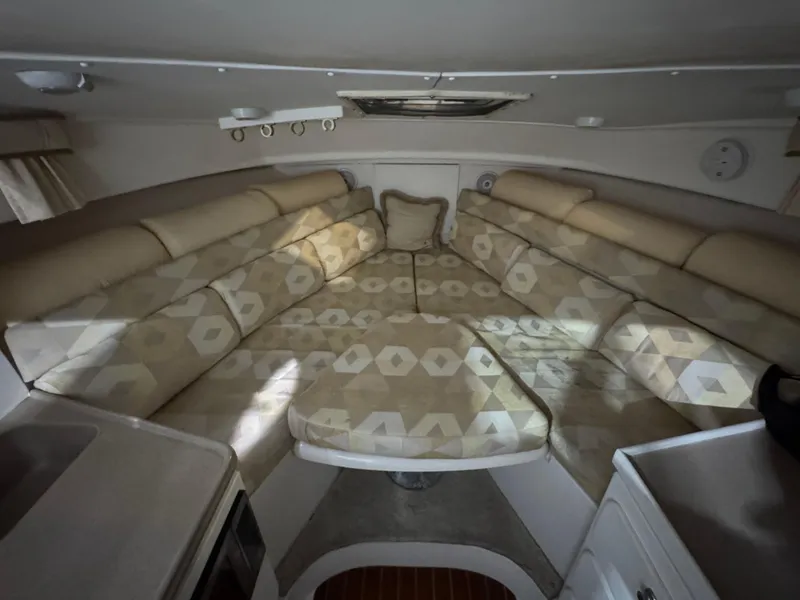 Slide: The Image of 2005 Stamas 310 Express cabin interior with patterned seating and compact design. - 21