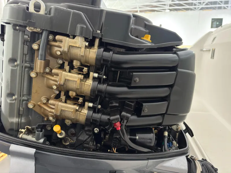 Slide: The Image of Close-up of a 2005 Stamas 310 Express boat engine components. - 29