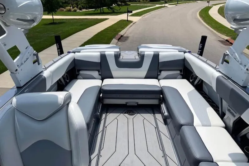Slide: The Image of 2020 Malibu Wakesetter 24 MXZ boat interior with spacious seating and modern design. - 5