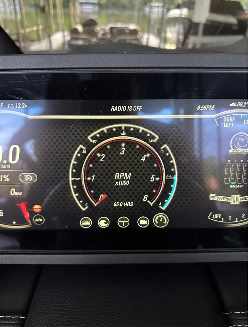Slide: The Image of 2020 Malibu Wakesetter 24 MXZ dashboard displaying RPM and boat settings. - 8