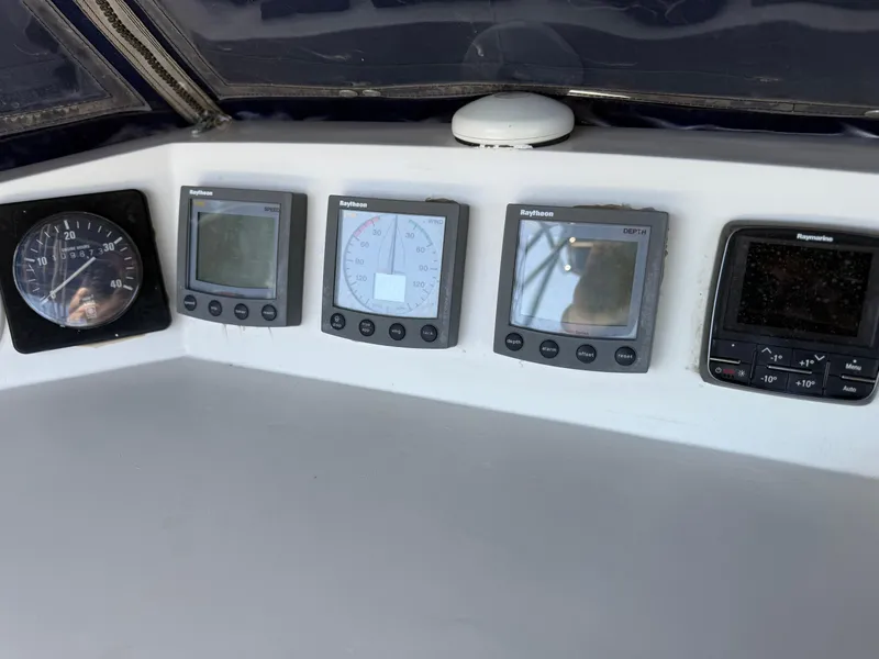 Slide: The Image of Control panel of a 1985 Nauticat 43 sailboat with Raytheon instruments. - 11